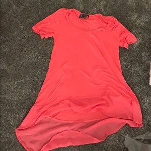 Small blouse with sheer tail.